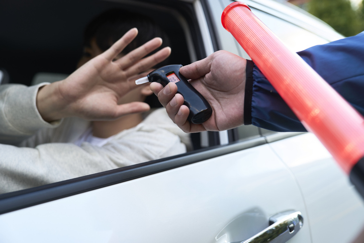 Drunk driving, human hands, breathalyzer test, refusal